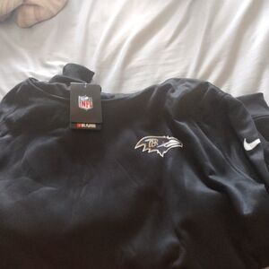 New Nike Balt Ravens pullover/ hoodie. New with tags.Says 4xl fits like a 2 xl